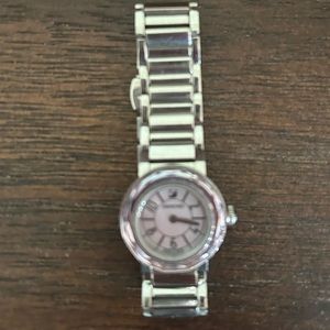 Womens Swavorski silver and purple watch.